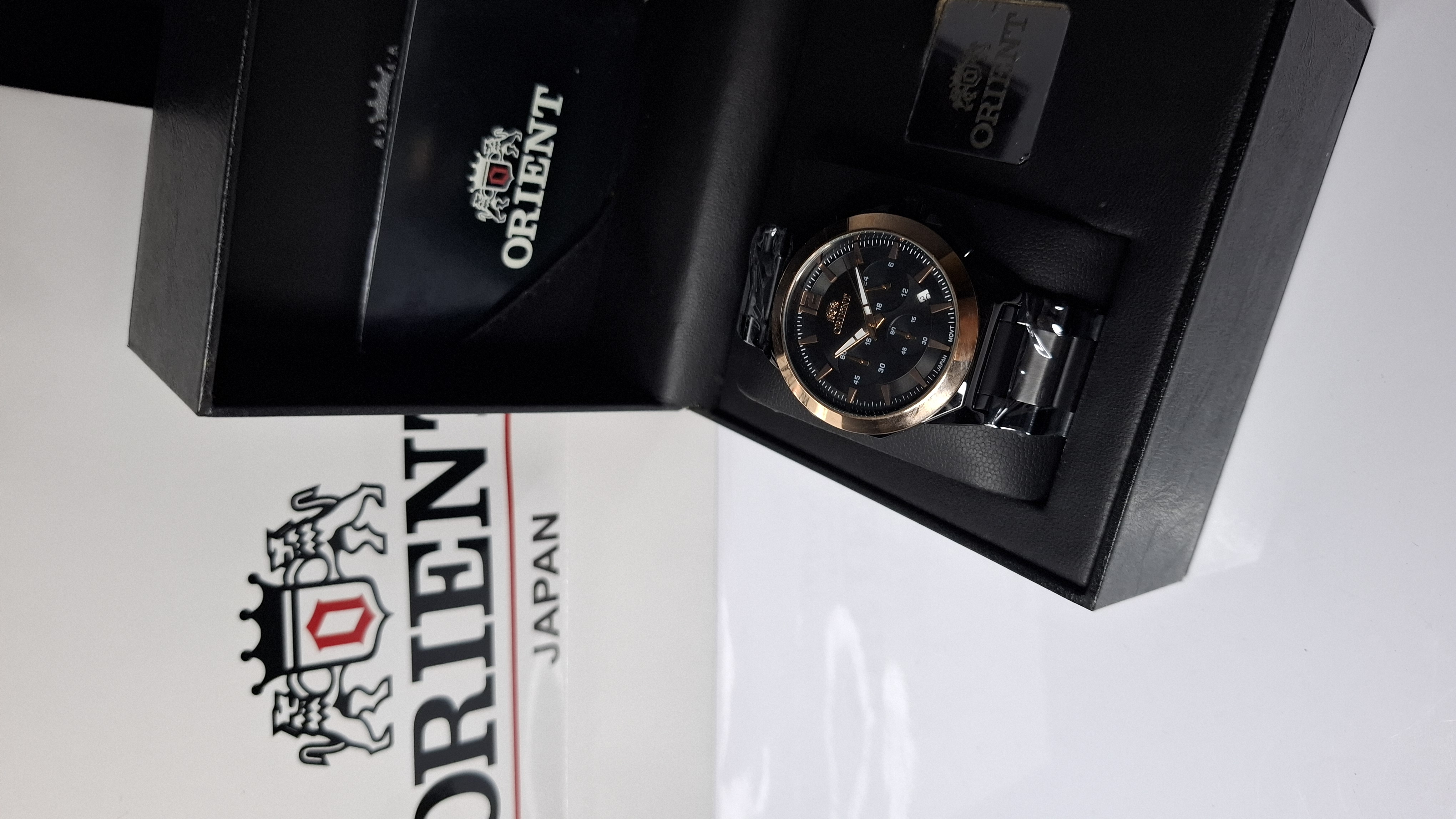 ساعت مردانه برند اورینت با جعبه و پاکت دفترچه اورینت