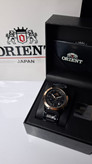 ساعت مردانه برند اورینت با جعبه و پاکت دفترچه اورینت