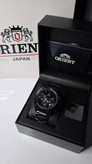 ساعت مردانه برند اورینت با جعبه و پاکت دفترچه اورینت