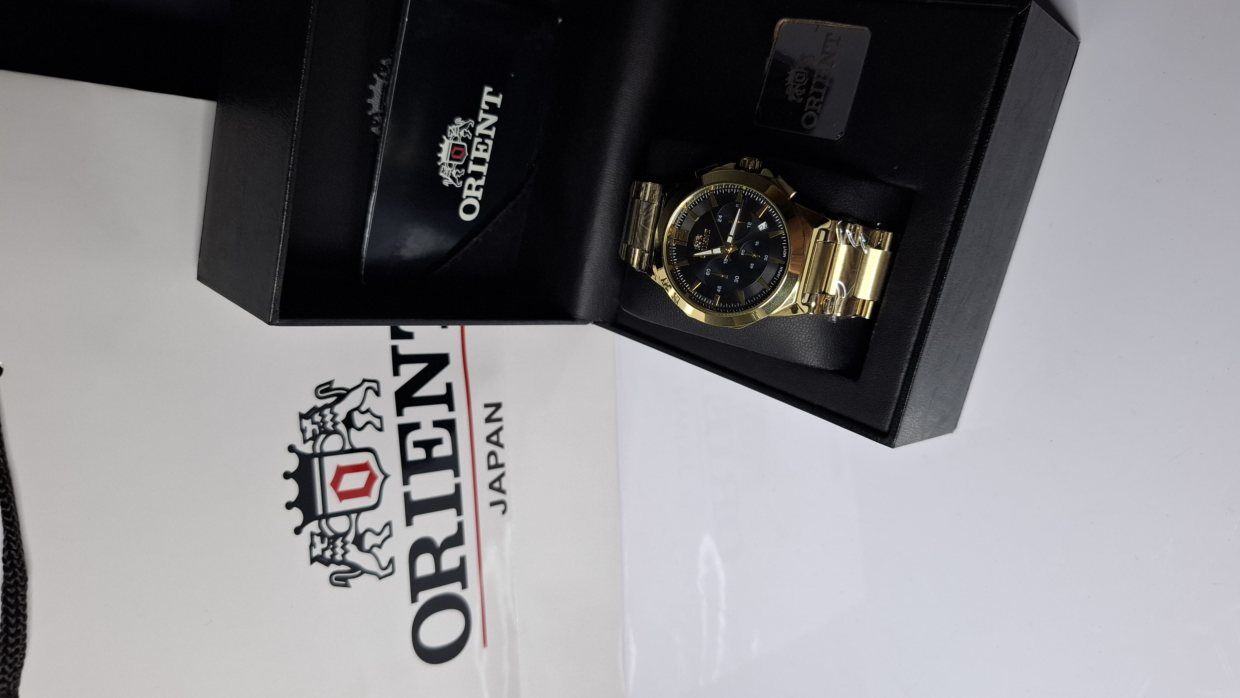 ساعت مردانه برند اورینت با جعبه و پاکت دفترچه اورینت