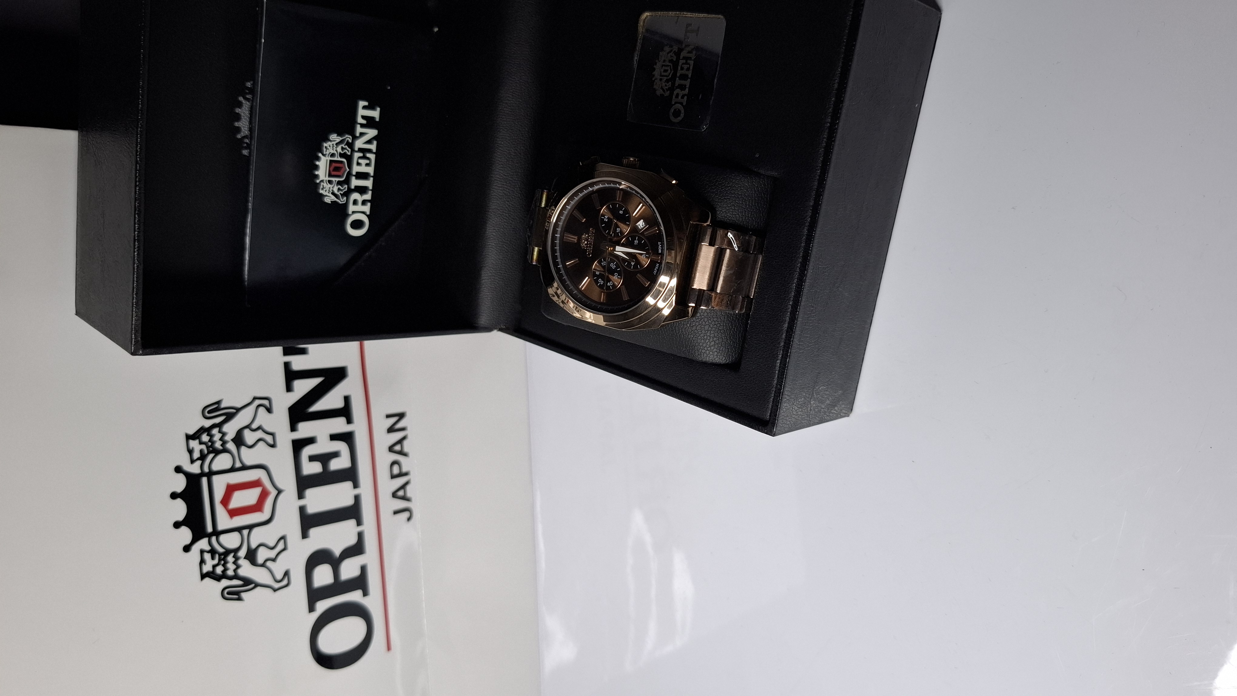 ساعت مردانه برند اورینت با جعبه و پاکت دفترچه اورینت