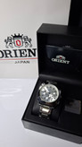 ساعت مردانه برند اورینت با جعبه و پاکت دفترچه اورینت