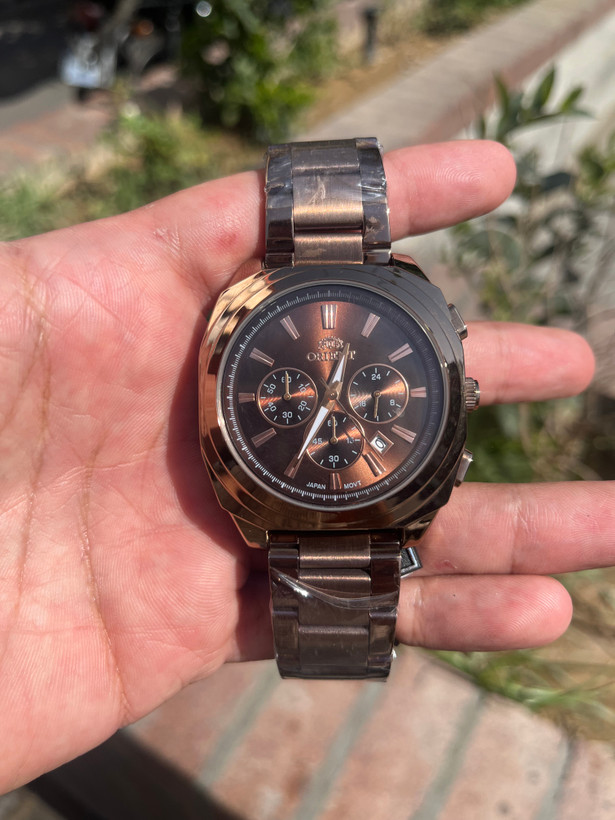 ساعت اورینت مردانه رنگ کافه ای